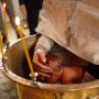 Ce a decis justiția în cazul preotului din Medgidia care a scăpat un copil în cristelniță