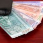 Țara care înlocuiește bancnotele vechi cu unele noi, pentru a opri răspândirea Covid-19