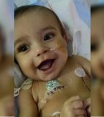 Un tatic si-a donat o parte din ficat pentru a-si salva baietelul bolnav
