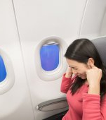 Urechi înfundate din cauza călătoriei cu avionul