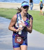 Super Mama: folosește pompa de sân în timp ce aleargă la o competiție IronMan