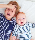 Părinții cu doi copii își pierd mințile, spun cercetătorii