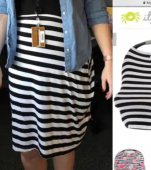 O mamă epuizată confundă husa de la scaunul auto cu o fustă, și o poartă cu succes