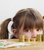 Studiu: nu copiii îi fac nefericiți pe părinți, ci costul creșterii lor