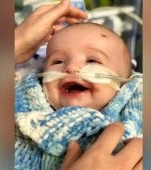 Un bebeluș s-a trezit din comă și a zâmbit părinților. Miracolele chiar există!