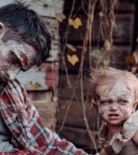 Ședință foto horror! O mamă își transformă fetița de 1 an în zombie și internetul o ia razna!