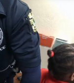 Video: O fetiță de 6 ani este încătușată și arestată de poliție. Motivul este șocant!