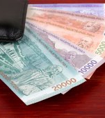 Țara care înlocuiește bancnotele vechi cu unele noi, pentru a opri răspândirea Covid-19