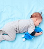 Cât de periculos este ca bebe să doarmă pe burtă?
