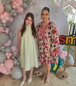 Isa, fiica Oanei Roman a absolvit clasa a IV-a. Ce mare și frumoasă a crescut, este deja domnișoară