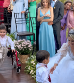 Imaginile care au topit internetul! Enzo, un băiețel diagnosticat cu paralizie cerebrală, a dus la altar verighetele la nunta mamei sale
