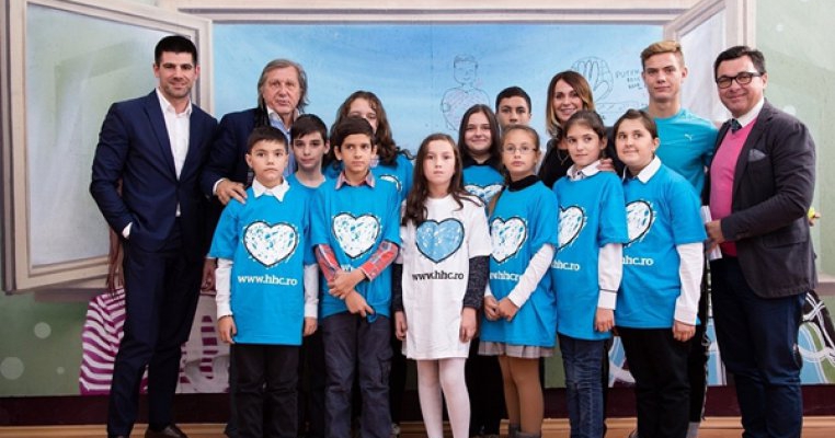 Nadia Comaneci si Ilie Nastase ii incurajeaza pe copiii supradotati din familii nevoiase sa-si deseneze un viitor mai bun