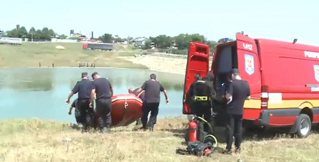 captura video cu salvatorii care au intervenit la barajul din Bacau