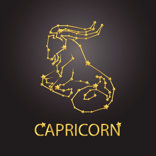 reprezentare a zodiei capricorn galben pe fundal negru