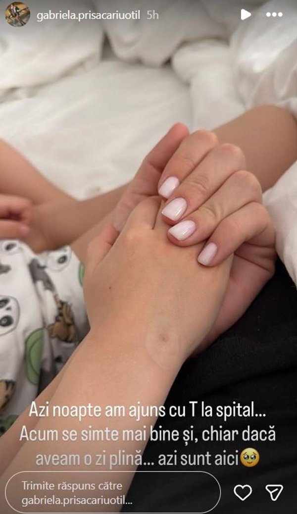 captura foto cu mana gabrielei otil cum tine mana fiului ei
